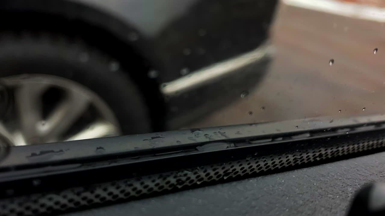 In the car while its snowing-raining