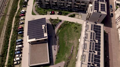 top down view of rooftops full of solar panels revealing collective building ubuntuplein project in zutphen, the netherlands