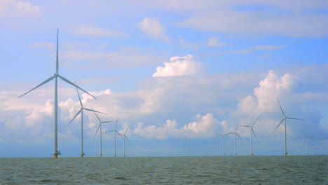 off shore wind park with storm clouds in the sky