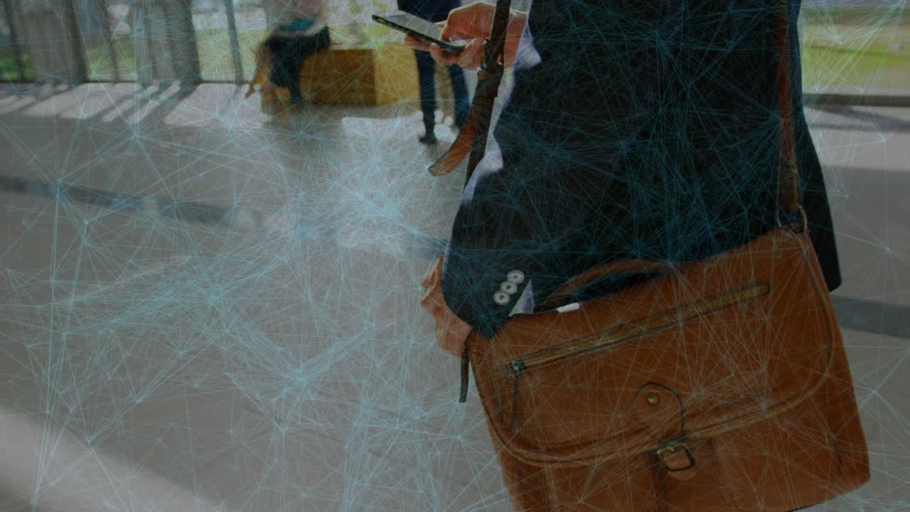 Businessman walking lobby scrolling phone adjusting bag and checking mail UI mapping route on phone