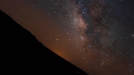 a milky way time lapse that illustrates how the earth rotates or spins in space - camera turns as the earth spins