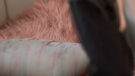 close-up of little girl wrapping birthday present or christmas gift at home