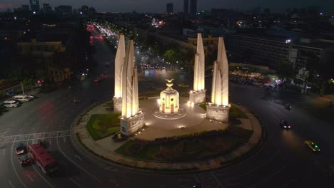 Multi-lane-traffic-circle-illuminated-in-the-evening