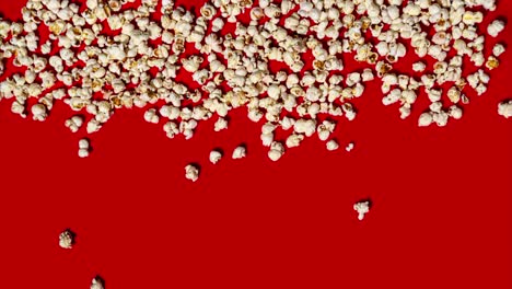 stop motion with popcorn on red background