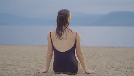 attractive girl playing in the sand