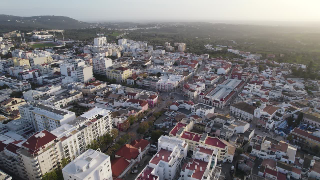Aerial establishing shot of Loulé Cityscape at morning, Algarve - Portugal
