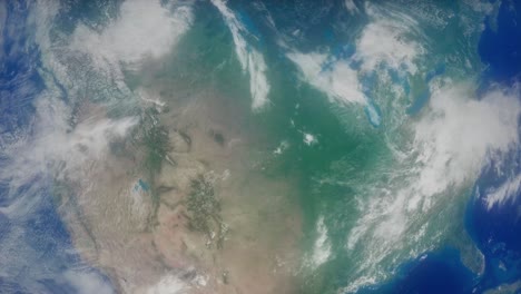 the united states of america and north america rotate through the frame, viewed from high in orbit in space in this 4k animation of the planet earth