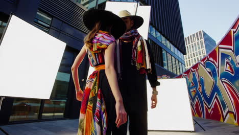 fashion photoshoot of two models in urban environment