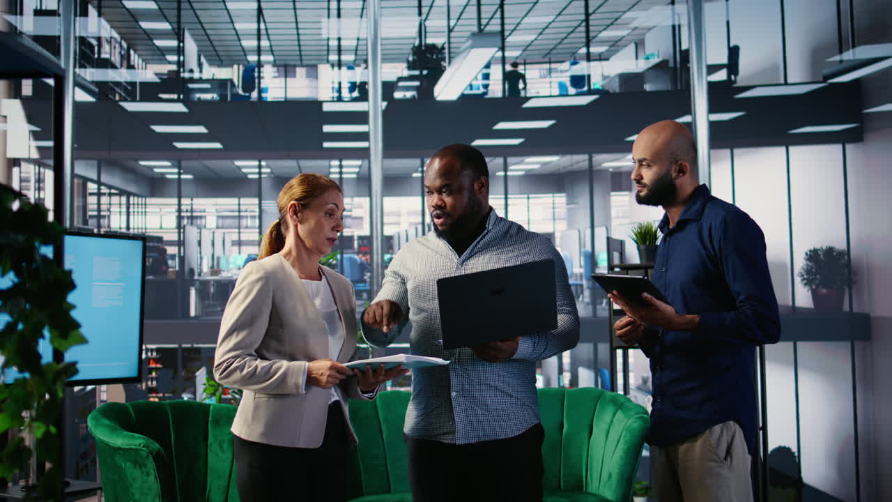 Vertical Video Multiethnic group of business partners discussing about a new growth strategy