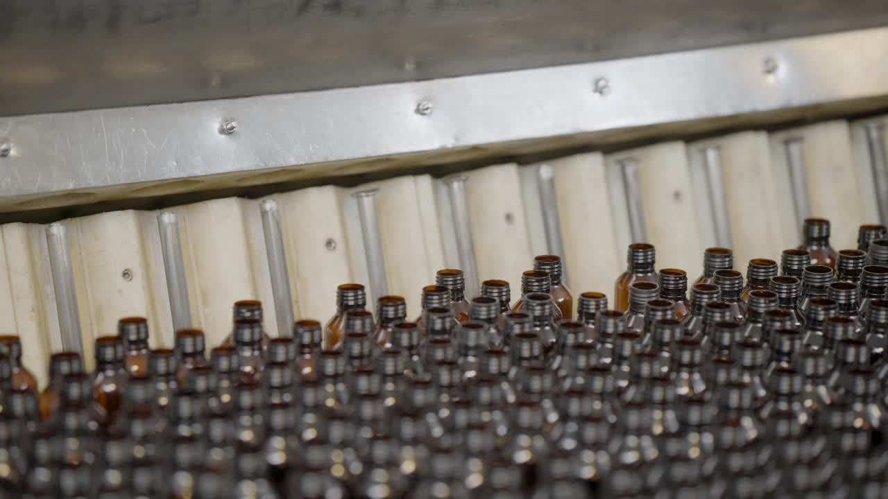 Syrup bottles coning out after a wash.
