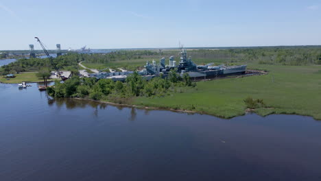 Wide-drone-shot-of-the-USS-North-Carolina-battleship-in-Wilmington-NC