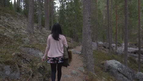 girl walking in the forest