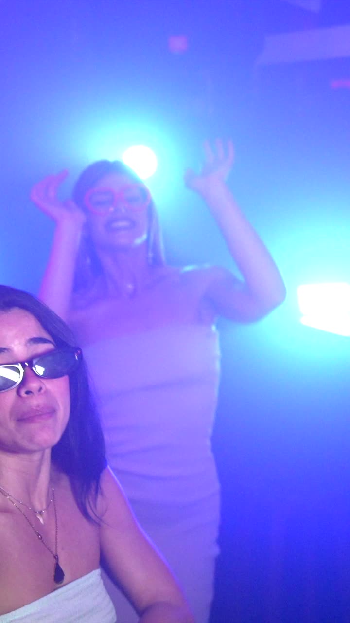 People enjoying a night out dancing and celebrating at a party