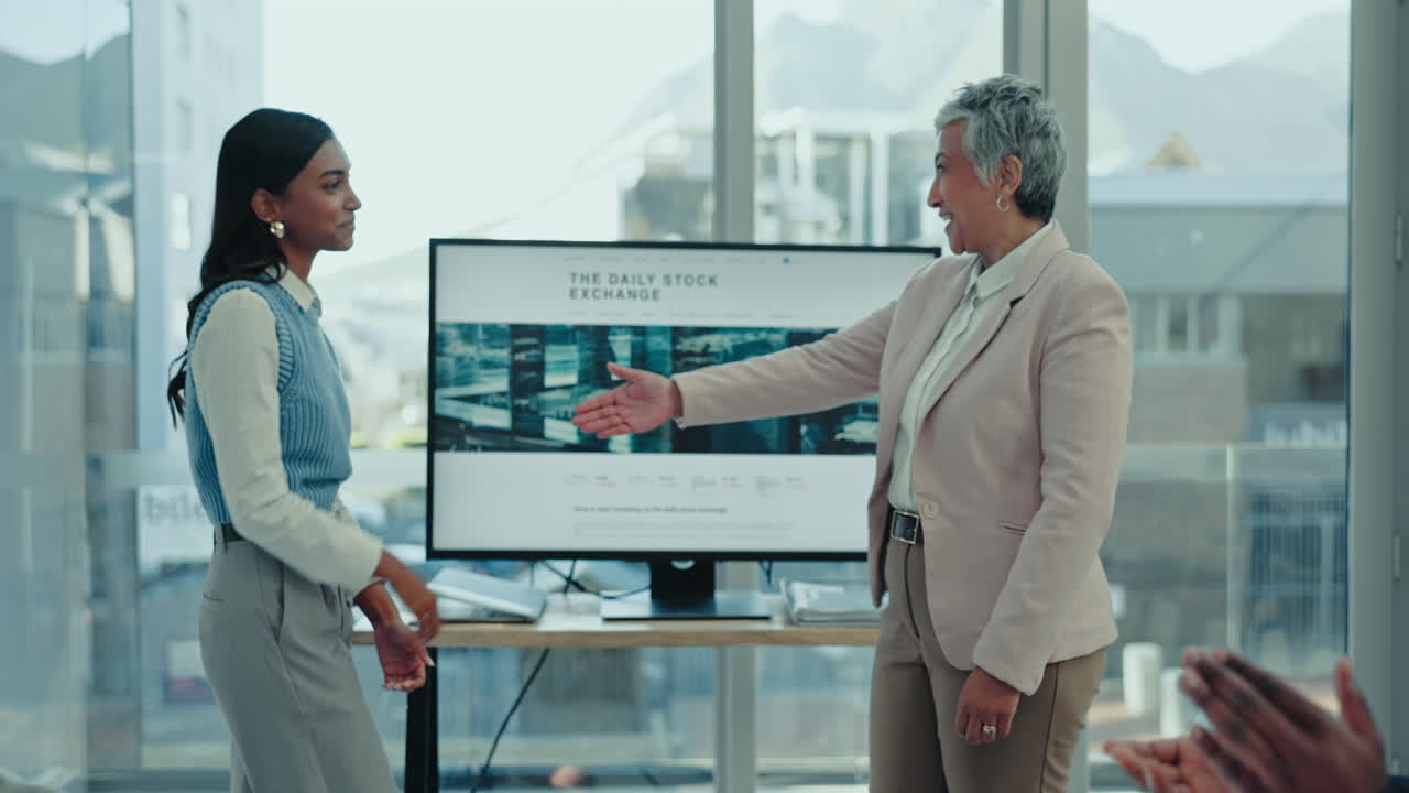Handshake, happy woman and business people