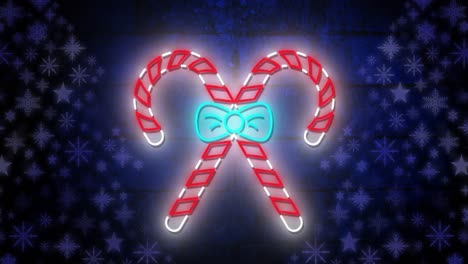 Animation-of-candy-canes-at-christmas-over-stars