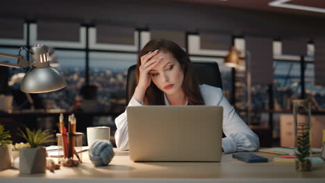 manager tired work routine at evening office with laptop closeup. woman reading