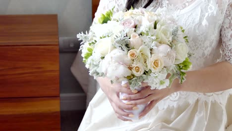 shot-of-bride---groom-with-wedding-flower