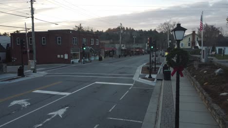 Blowing-Rock-North-Carolina-Reverse-Aerial-of-Downtown-with-Christmas-wreath-in-shot