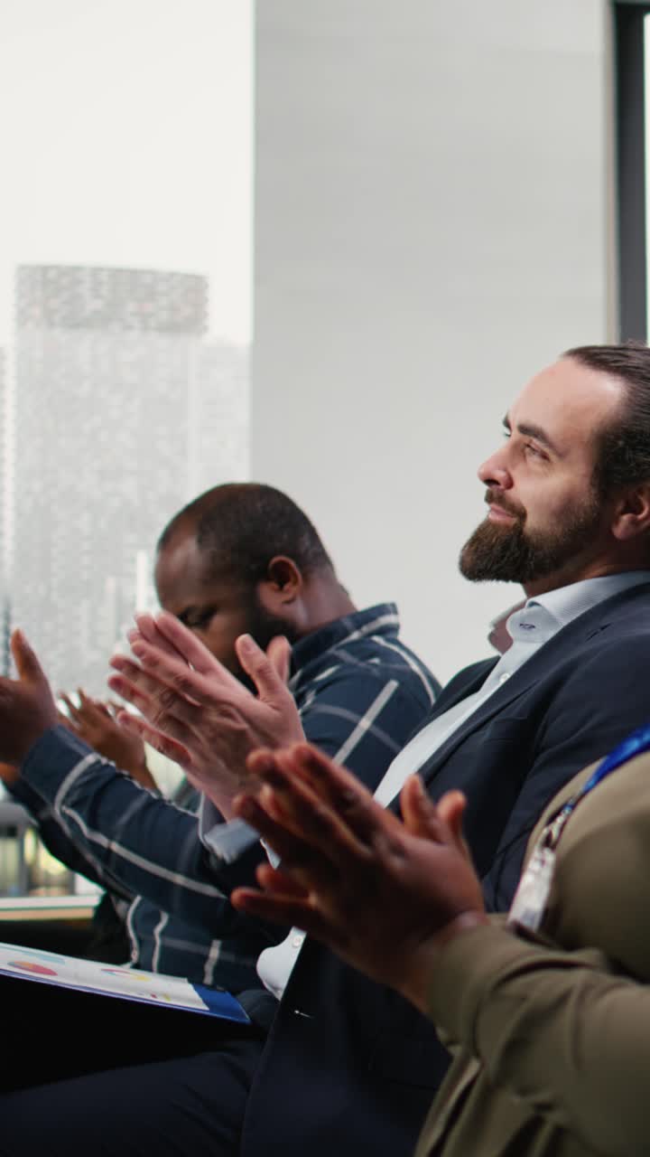 Vertical Video Business conference featuring clapping hands and applauding listeners