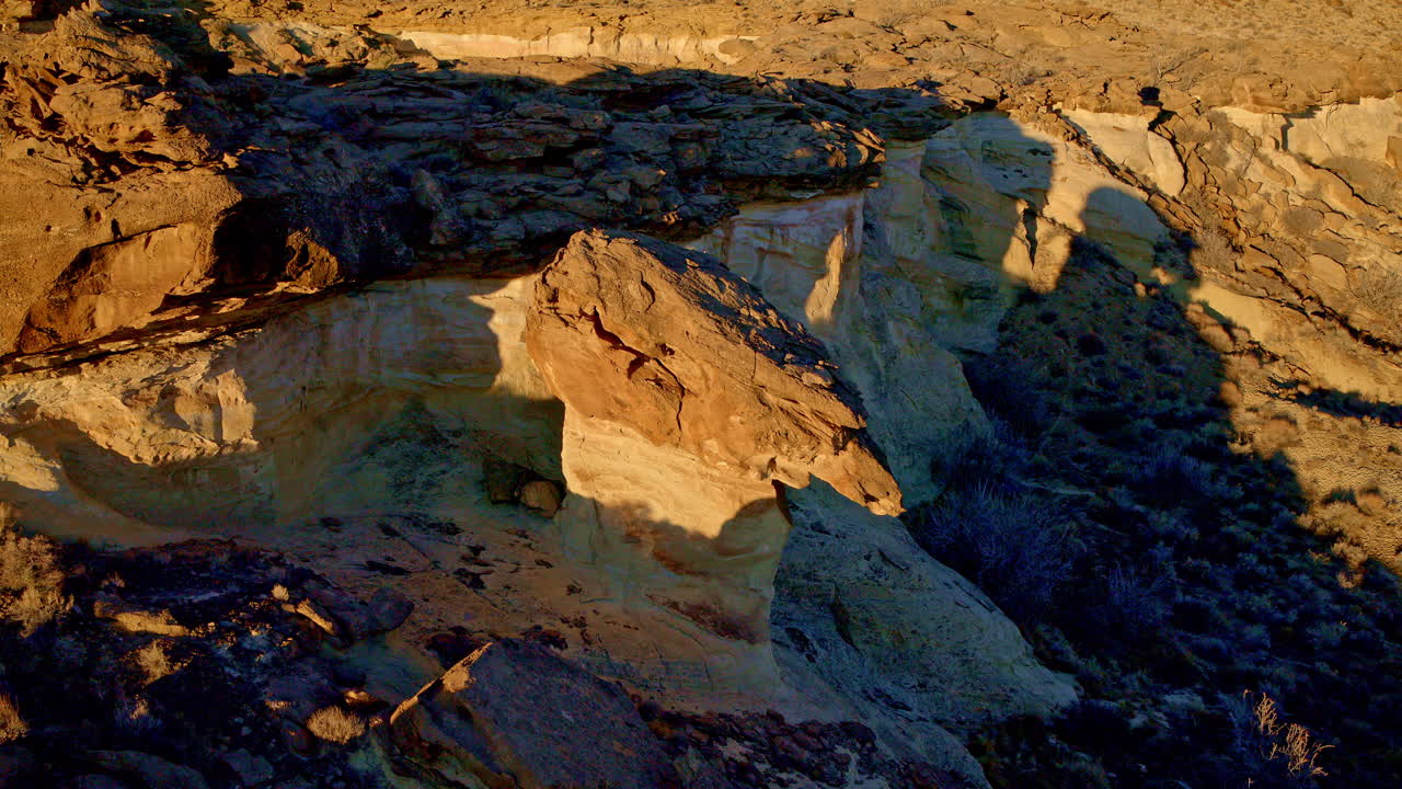 Drone shot looking at the surreal landscape in the american southwest full of shapes and colors.