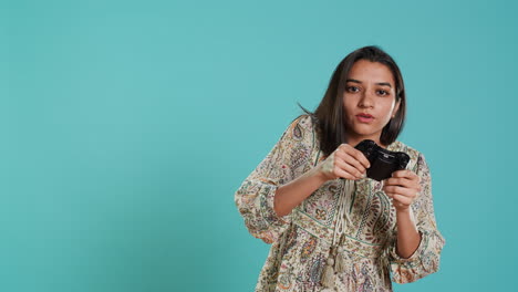 cheerful woman playing videogames with controller