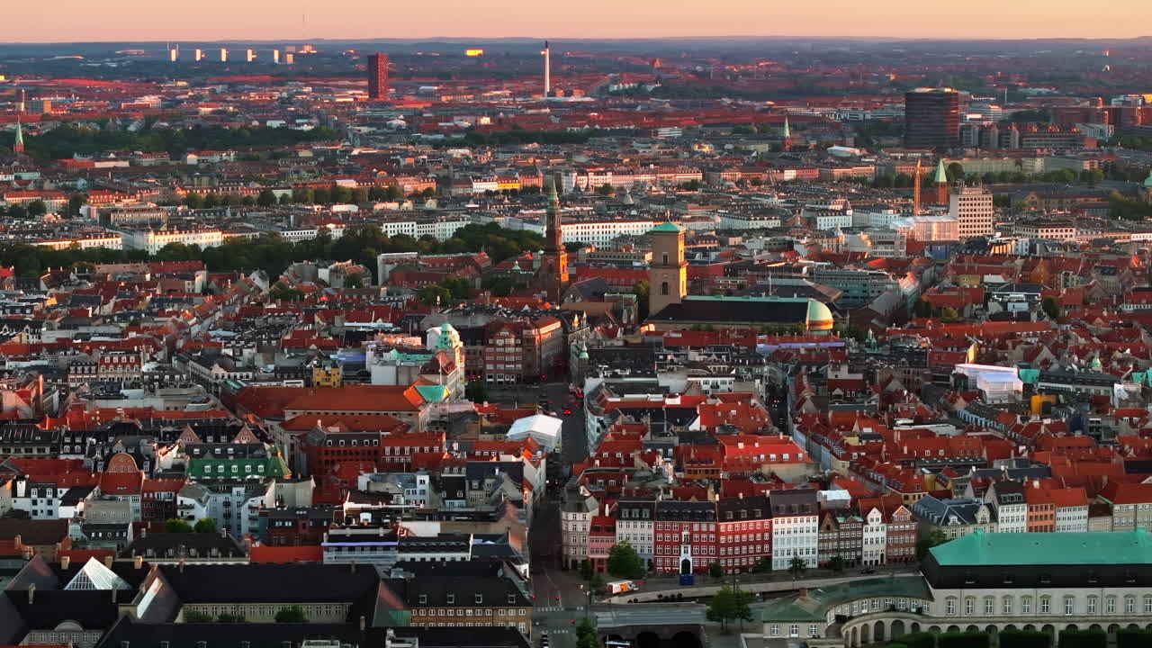 Aerial drone view of the city centre of Copenhagen, Denmark at sunset