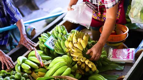 vendor selling bananas at a floating market
