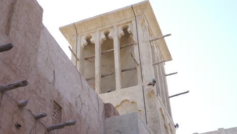 Wind-Tower-With-Installed-CCTV-In-The-Historic-Neighborhood-Of-Al-Fahidi-In-Dubai,-UAE