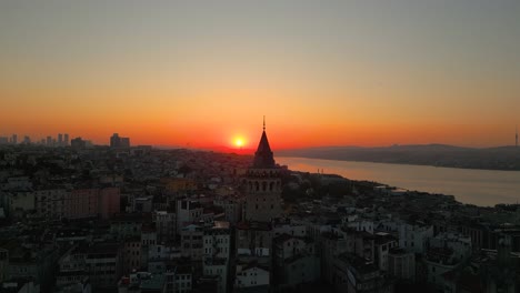 4k cinematic drone footage featuring istanbul’s iconic galata tower rising above the historic beyoğlu district at golden hour. istanbul -turkey_04