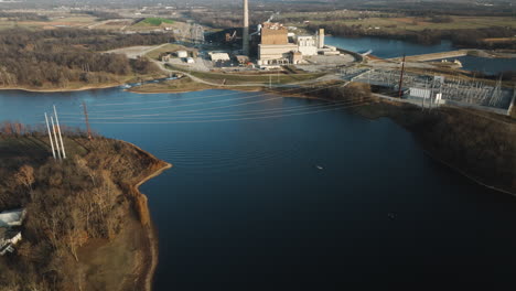 flint creek power plant beside lake swepco in arkansas, evening light, aerial view