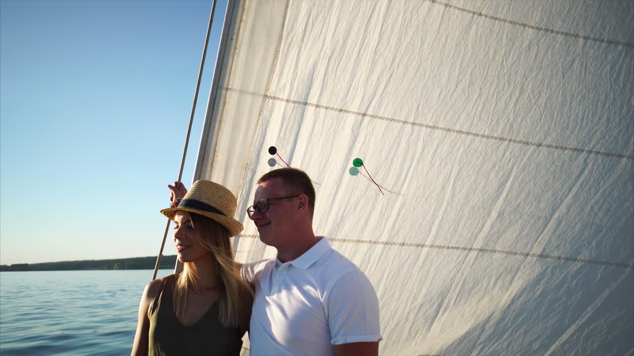 Couple Sailing on a Lake