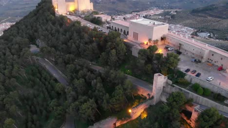 jaen's castle saint catalina castle spain shoot with a drone at 4k 24fps showing the exterior and the city from multiple points on a afternoon in december.