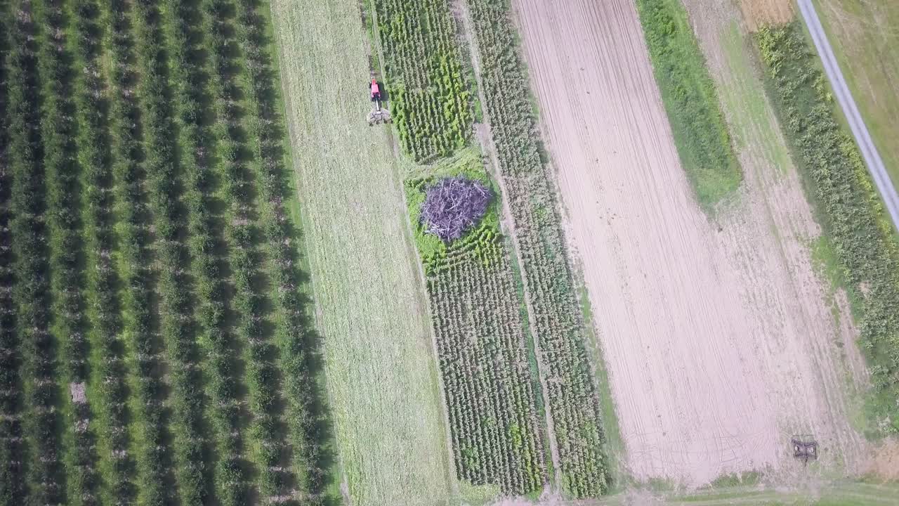 Aerial View of Farmland with Crops and Tractor