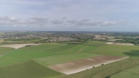 aerial tracking forward towards the historic town of dorchester from the south