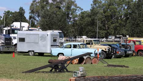 classic cars and trucks displayed at outdoor event