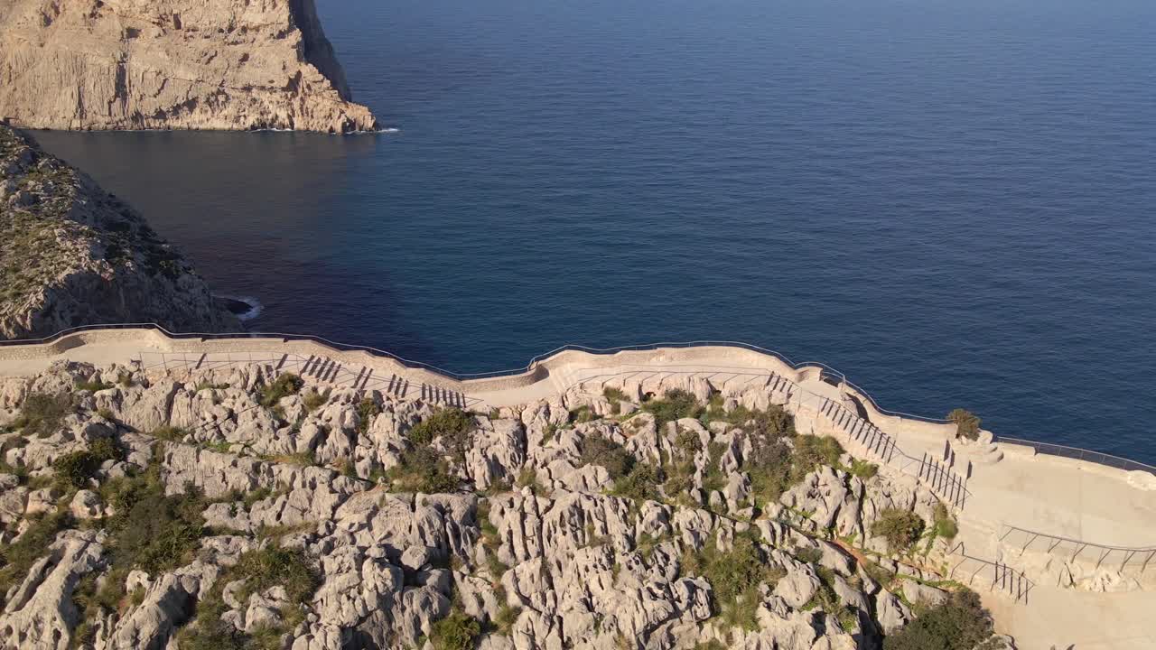 Explore stunning coastal landscapes from Mirador es Colomer, showcasing the beauty of Cap Formentor in Mallorca. Enjoy serene vistas over the turquoise sea and rugged cliffs.