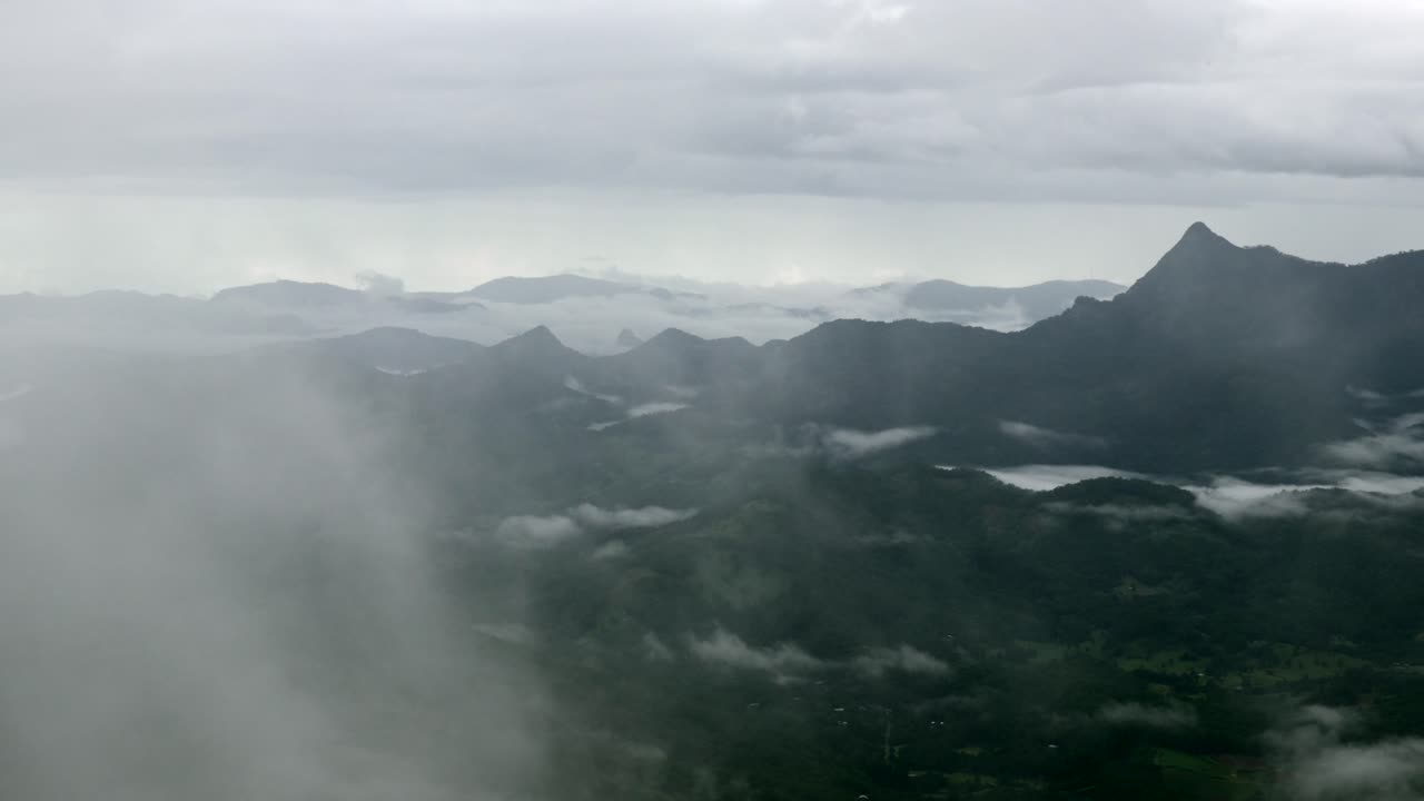 Majestic Mountain Range with Fog and Mist