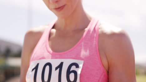 sportswoman with stopwatch