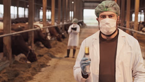 caucasian doctor with syringe on farm