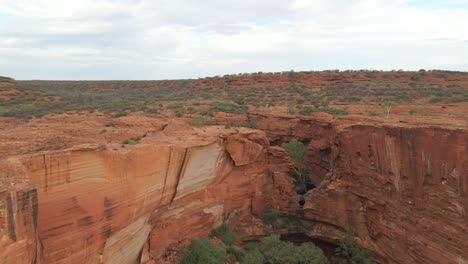 Drone-Fly-Over-Red-Sandstone-Gorge-Of-Kings-Canyon-In-Northern-Territory,-Australia