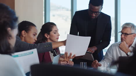 corporate business people meeting in boardroom team leader man brainstorming with colleagues discussing strategy sharing problem solving ideas collaborating in office 4k