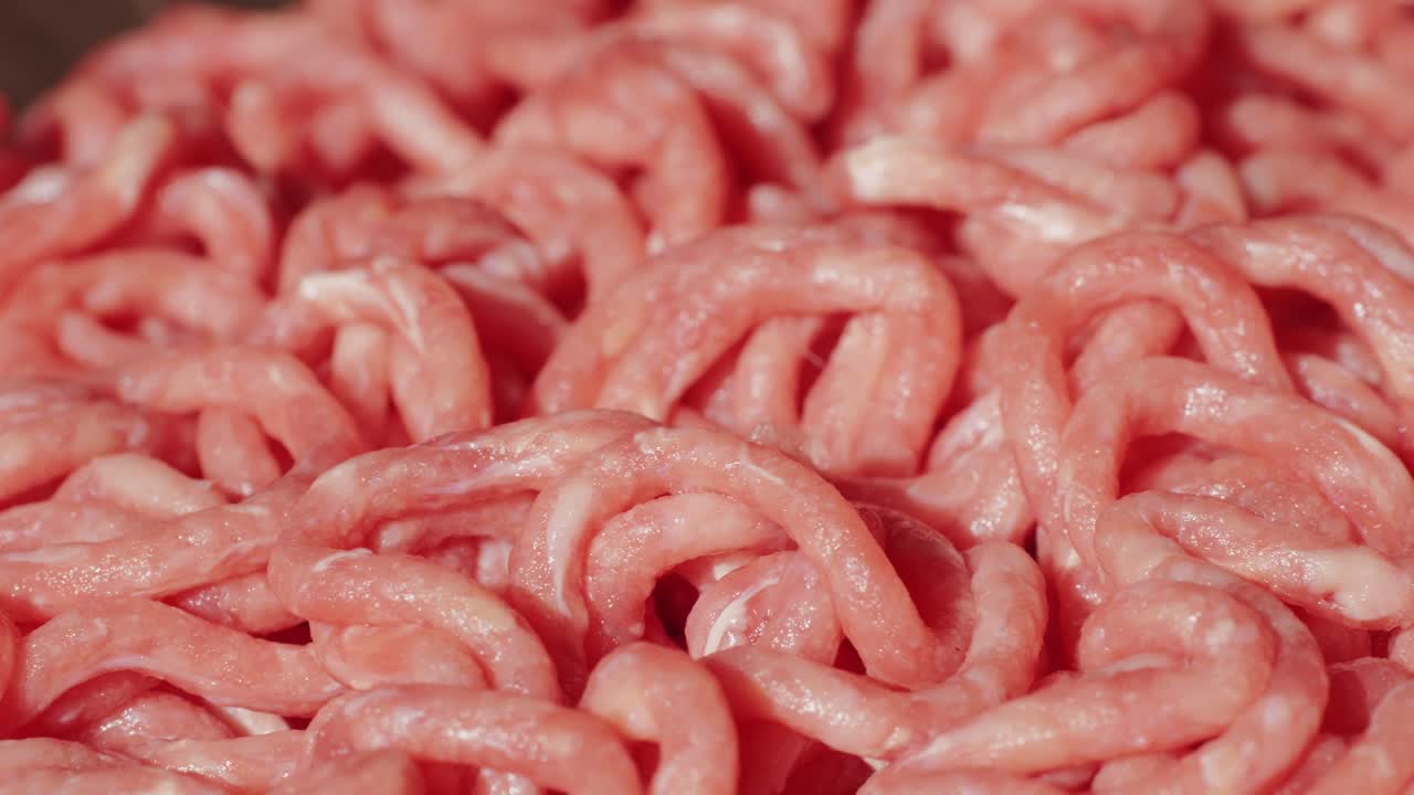 Fresh pork and beef minced meat macro close up. Chicken turkey mix burger meat.