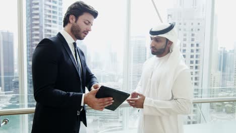 arabic american male business team tablet technology downtown