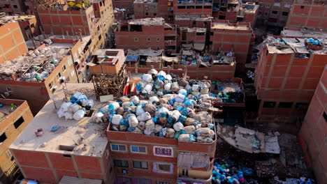 cairo’s garbage city densely packed - drone shot