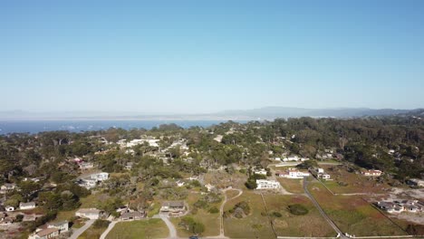 Aerial-Zoom-out-of-Asilomar-Beach-in-Monterey