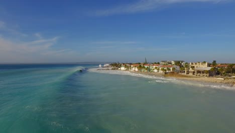 Big-waves-damaging-houses-after-a-hurricane-passed-by-at-the-coastline-of-Bonaire