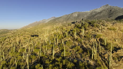 Drone-footage-flying-towards-rocky-desert-mountain