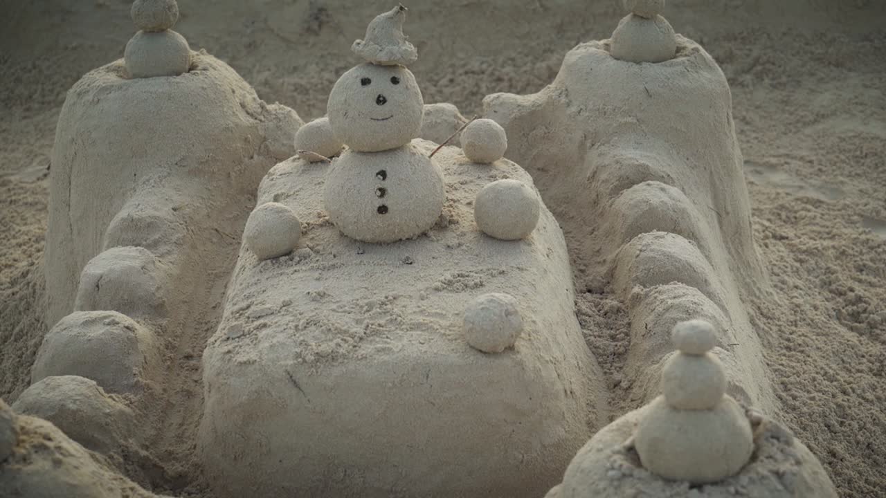 People made art castle on the sand on the Carribean beach during their vacation and leisure while relaxing after swimming