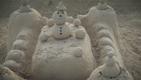 people made art castle on the sand on the carribean beach during their vacation and leisure while relaxing after swimming