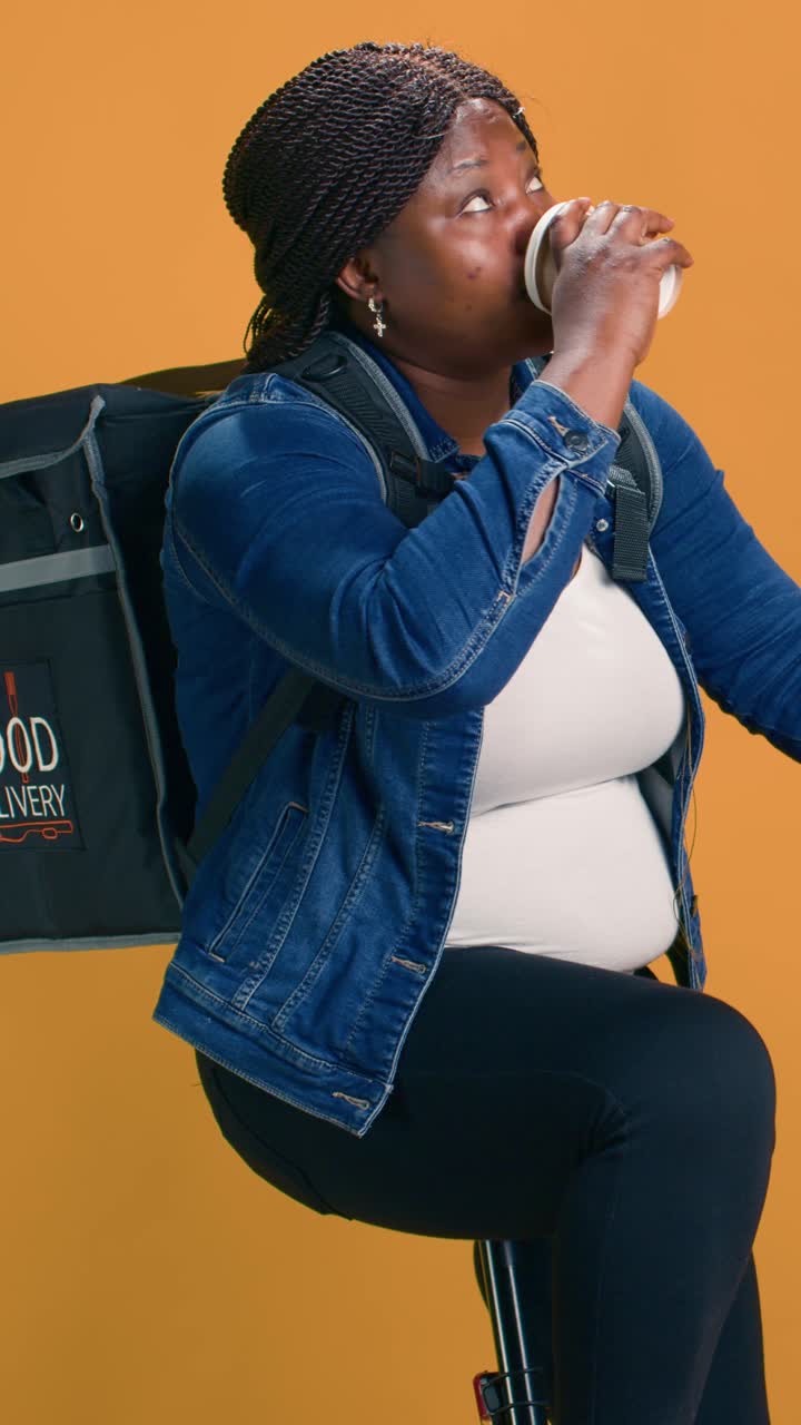 Food delivery woman with coffee